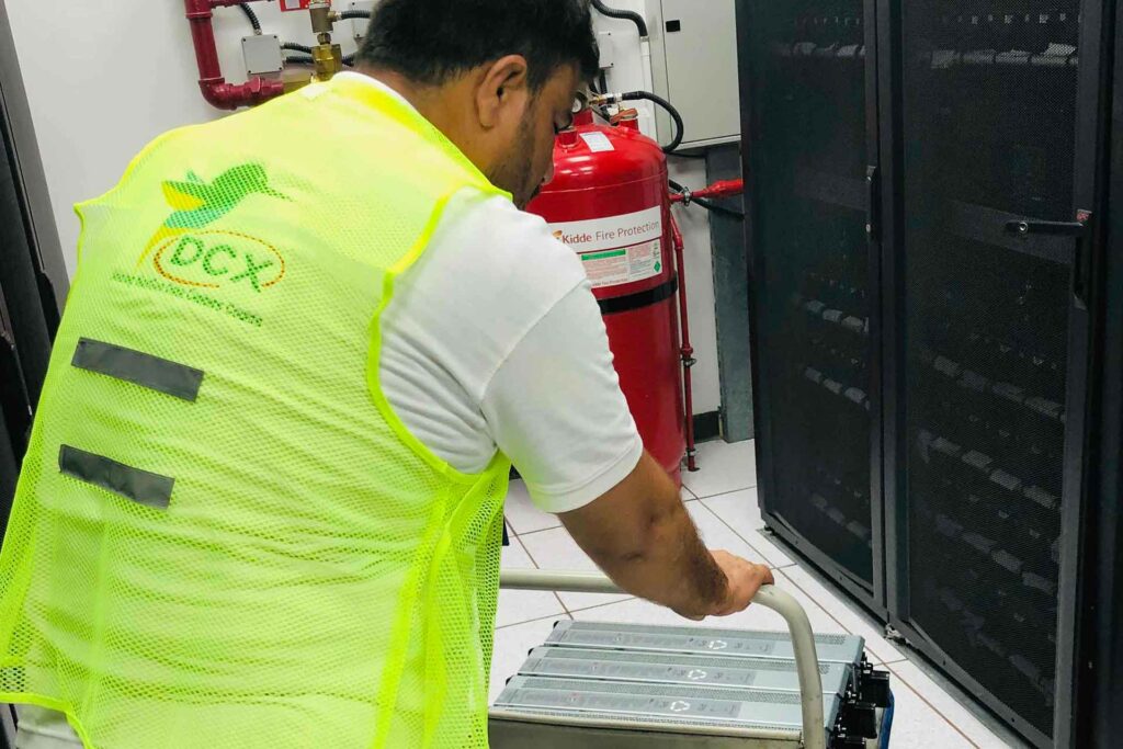 DCX Power team performing data center UPS batteries installation