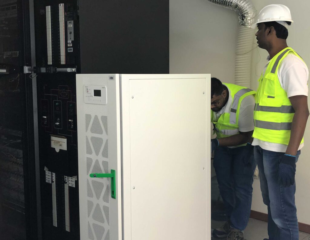 DCX Data Center Power Team performing 3P UPS installation