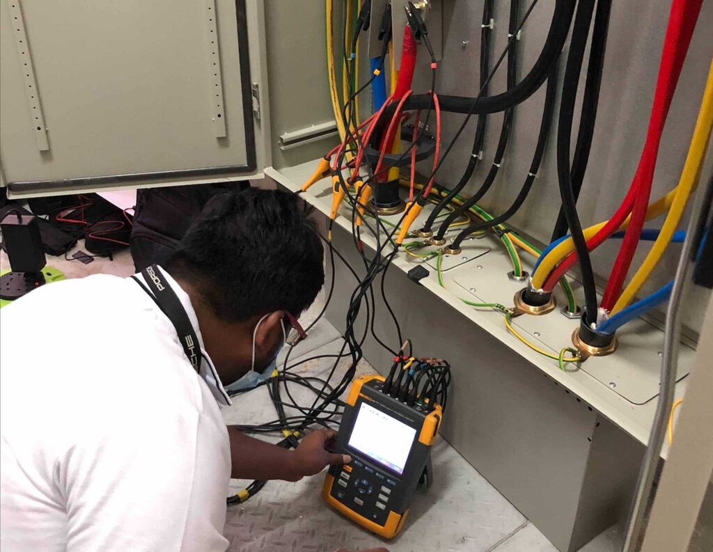 DCX Power Quality Team performing PQA test 3P (3 phase) Electrical Distribution Panel