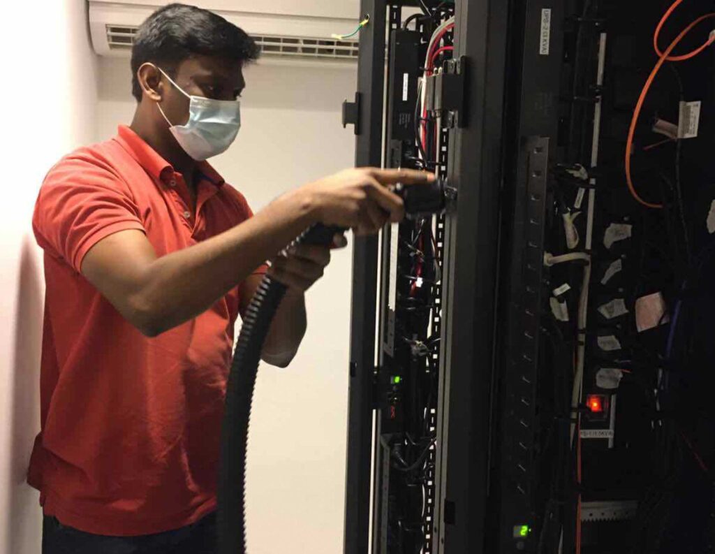 DCX Team performing data center deep cleaning