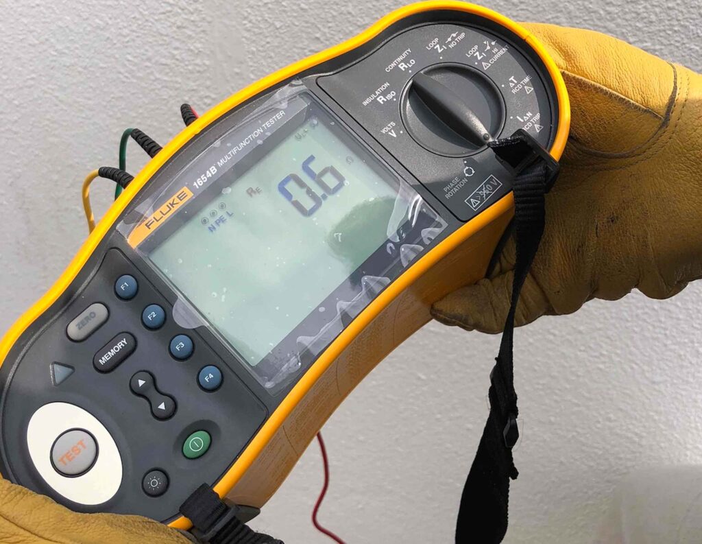 DCX Power Quality Team performing Phase Sequence Analysis via Fluke 1654C